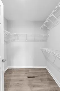 a view of an empty walk in closet