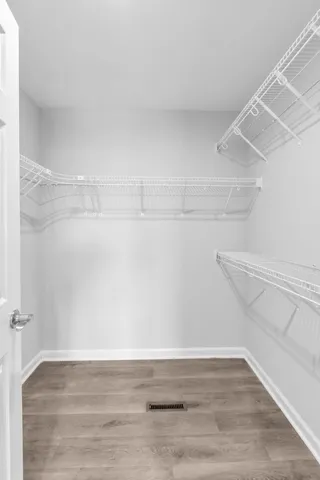 a view of an empty walk in closet