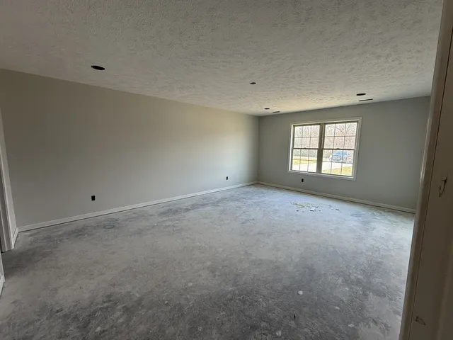 a view of livingroom and kitchen space