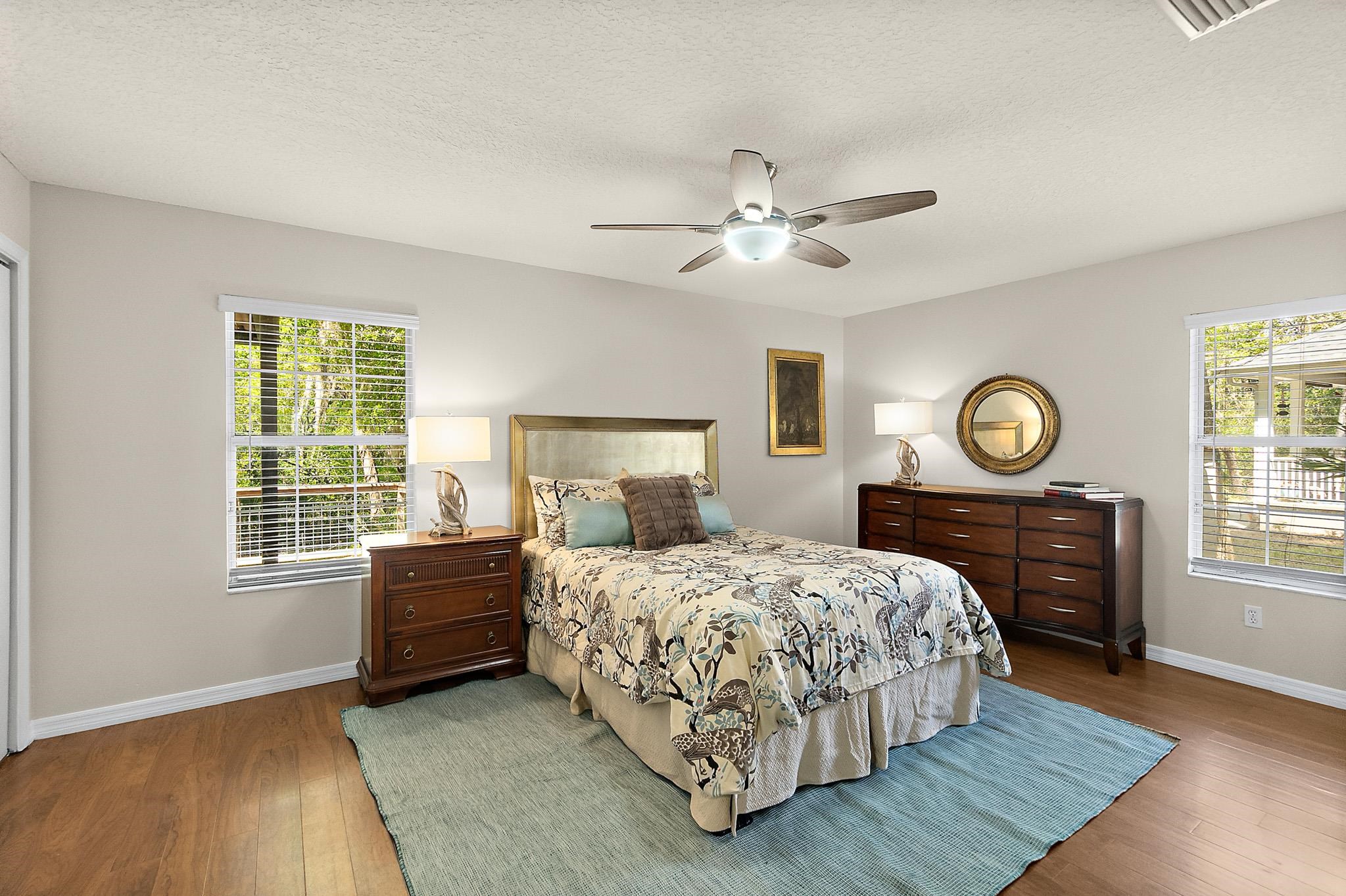 3253 Turtle Creek Road St. Augustine, FL 32086 - Photo 15 of 40 Bedroom with hardwood / wood-style floors, ceiling fan, and a textured ceiling