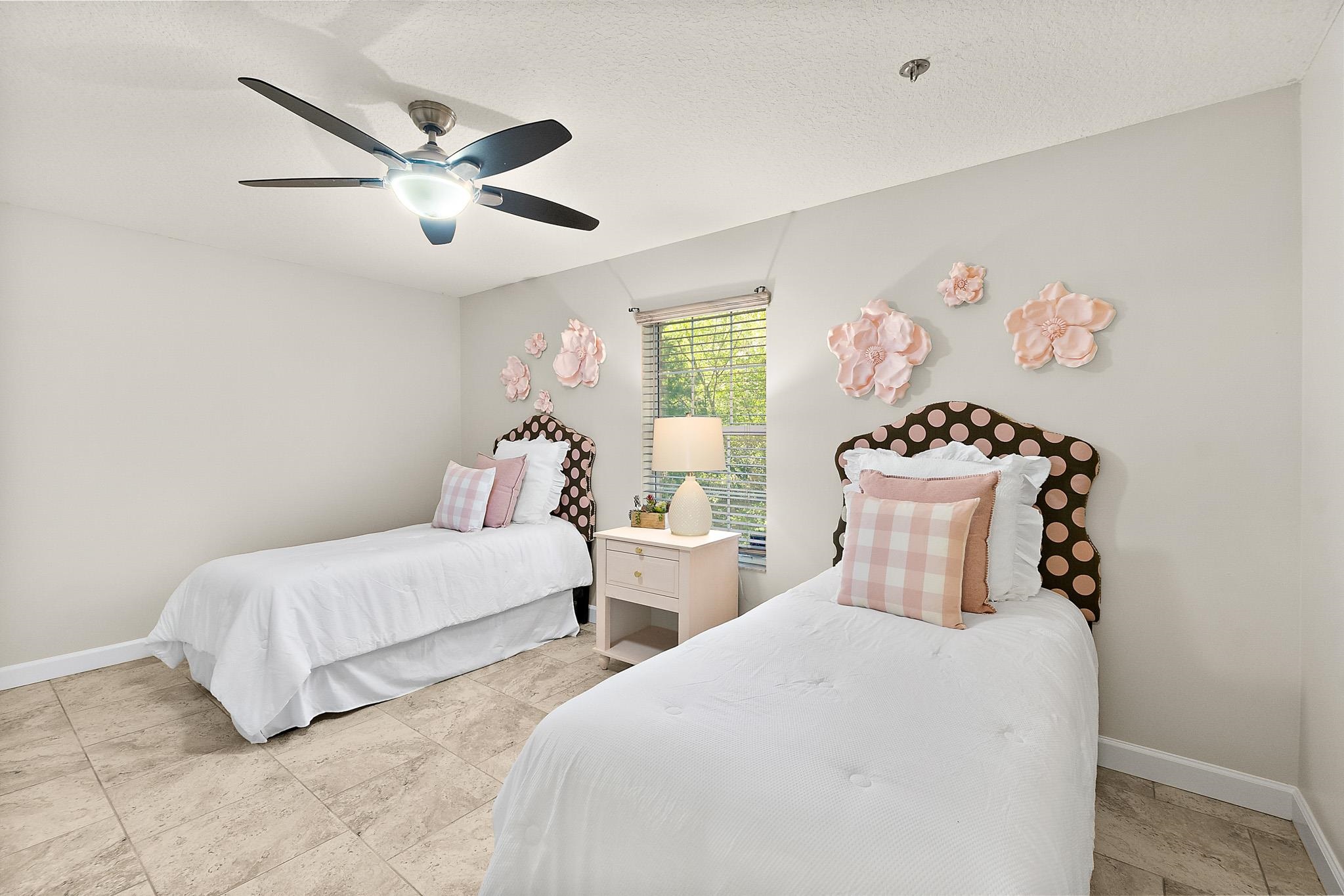 3253 Turtle Creek Road St. Augustine, FL 32086 - Photo 22 of 40 Bedroom with ceiling fan and a textured ceiling