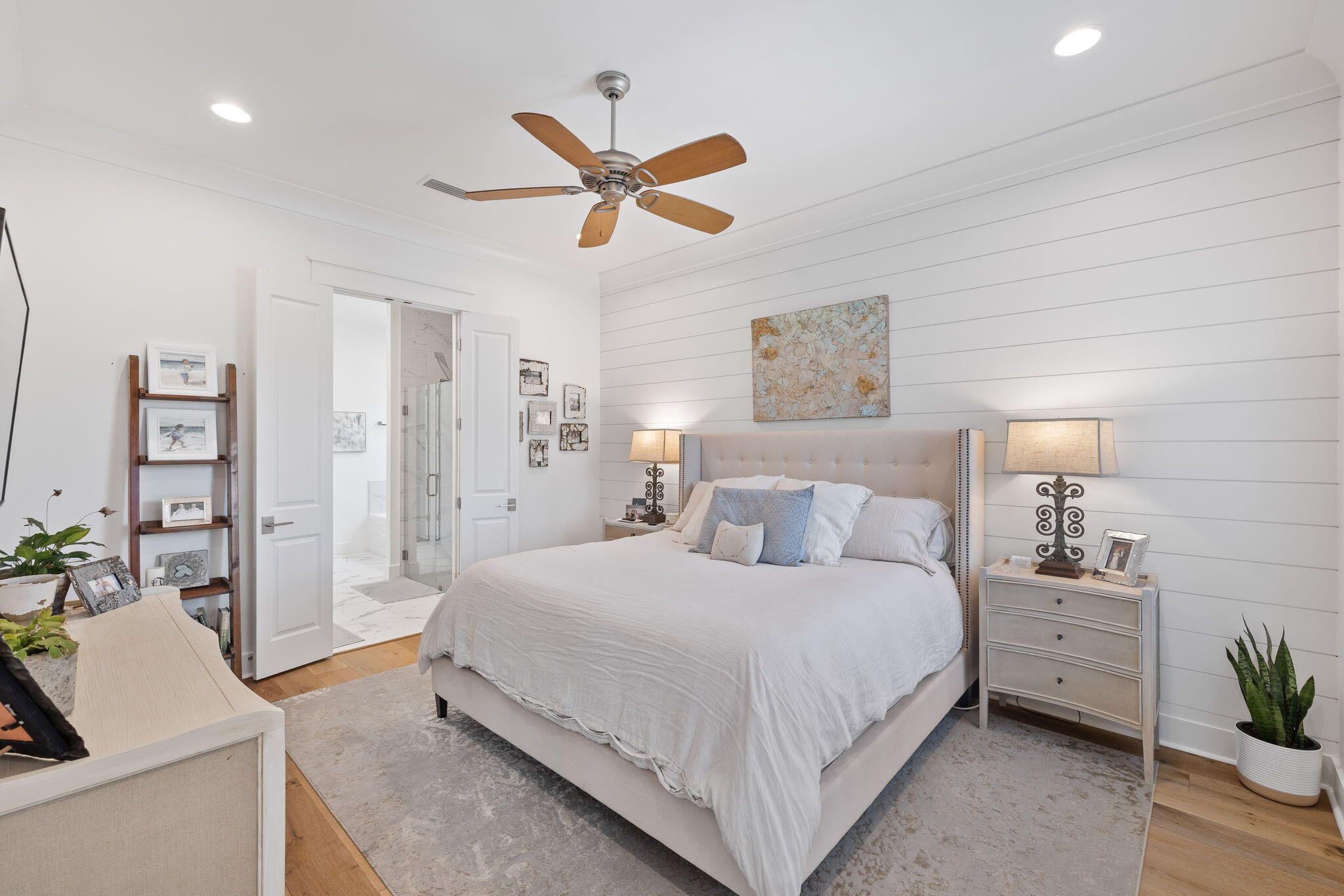 158 Trailhead Drive Inlet Beach, FL 32461 - Photo 18 of 35 a bedroom with a bed and a chandelier