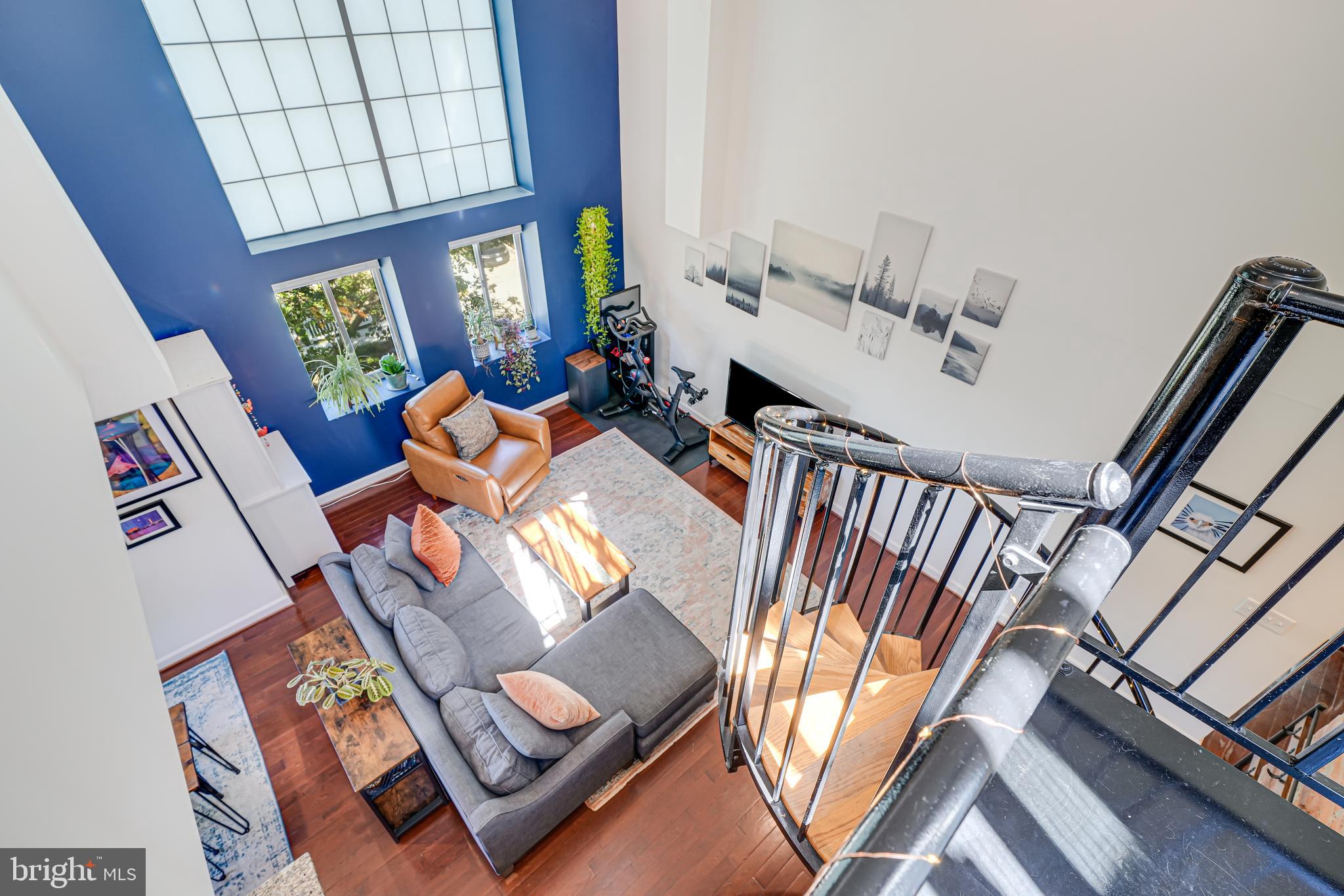 5407 9th Street Northwest, Unit 310 Washington, DC 20011 - Photo 47 of 53 an aerial view of a livingroom with furniture and a couch