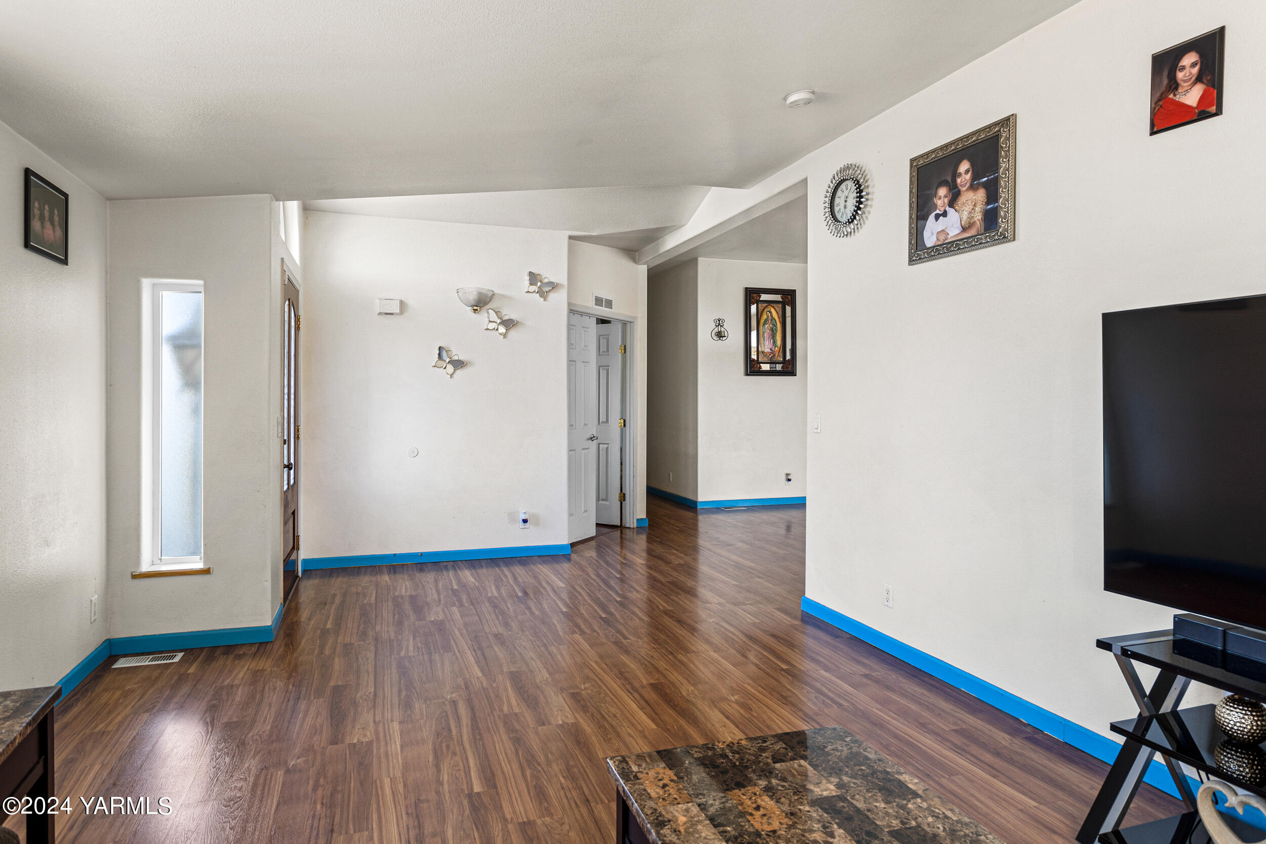 1649 Progressive Road Wapato, WA 98951 - Photo 15 of 30 a view of livingroom with hardwood floor and hallway