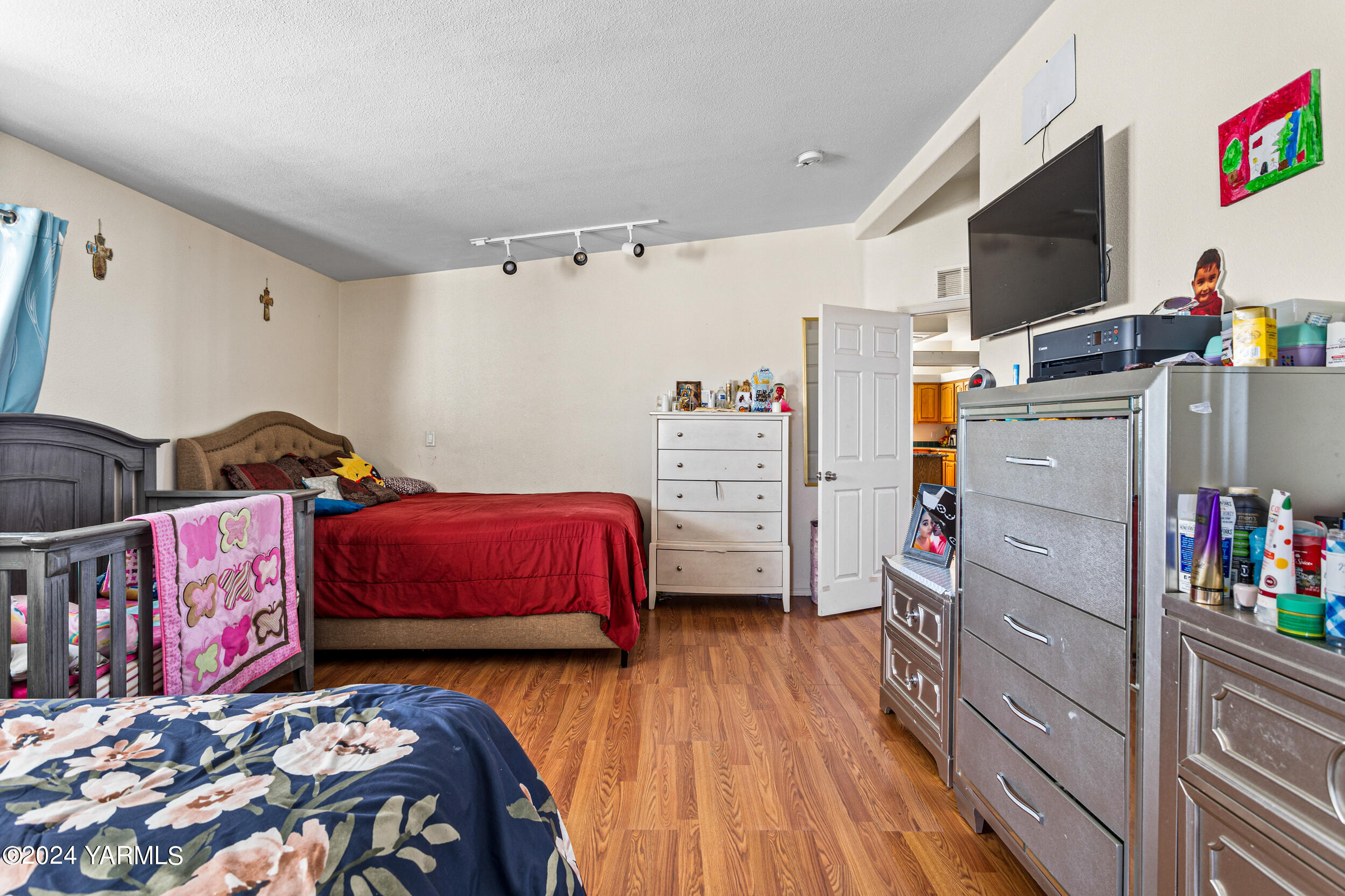 1649 Progressive Road Wapato, WA 98951 - Photo 21 of 30 a bedroom with bed and a closet