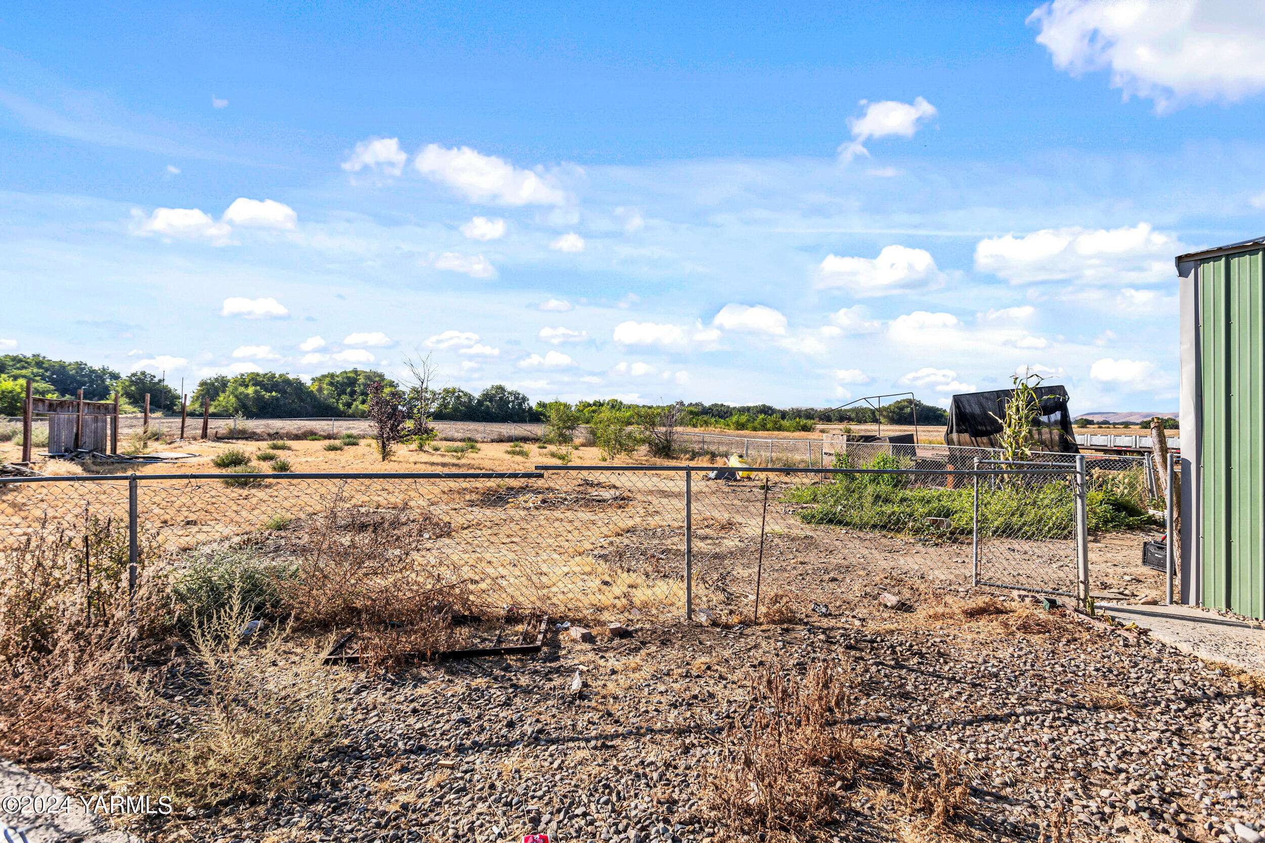 1649 Progressive Road Wapato, WA 98951 - Photo 25 of 30 a view of a lake with a beach