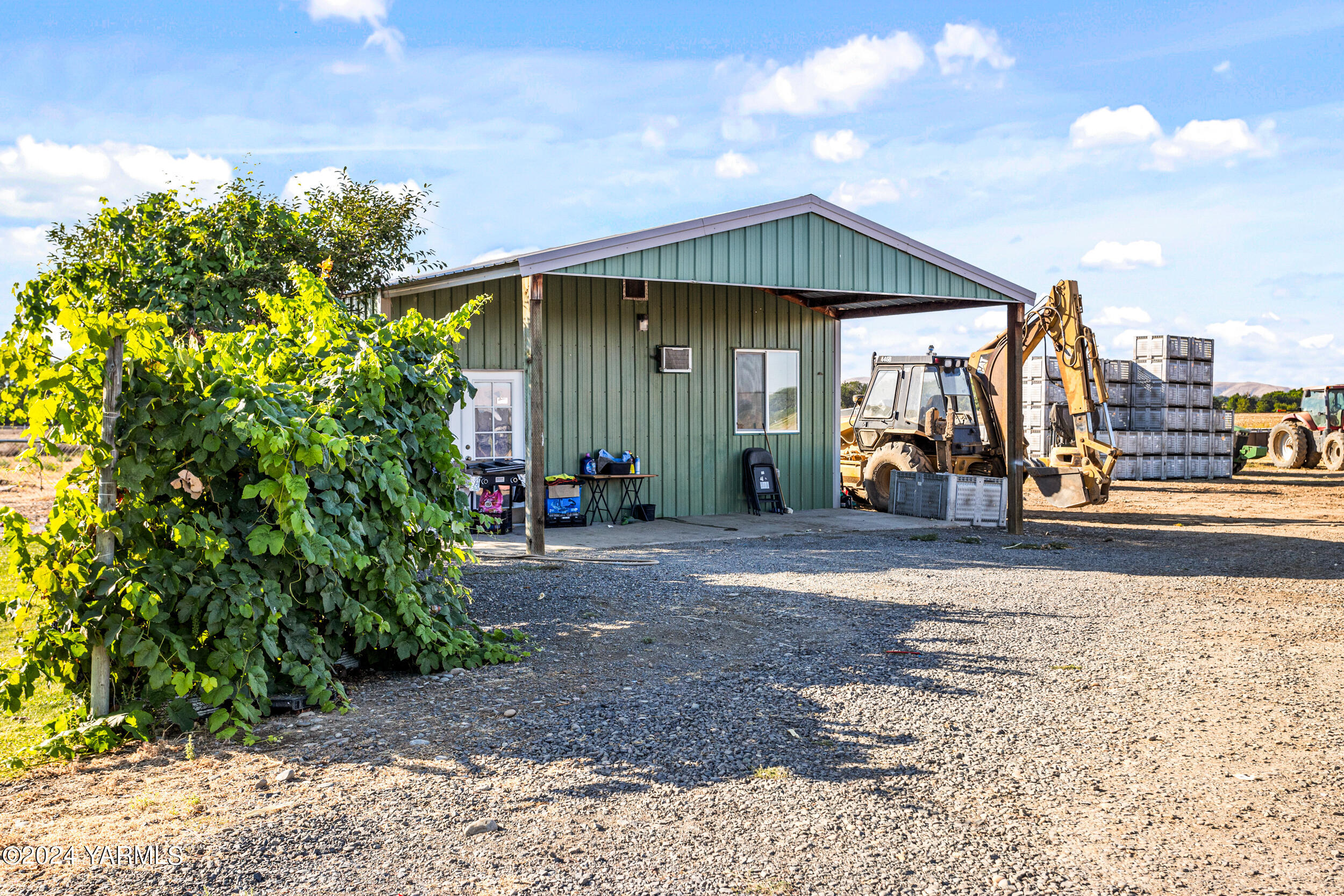 1649 Progressive Road Wapato, WA 98951 - Photo 4 of 30 a front view of a house with garden