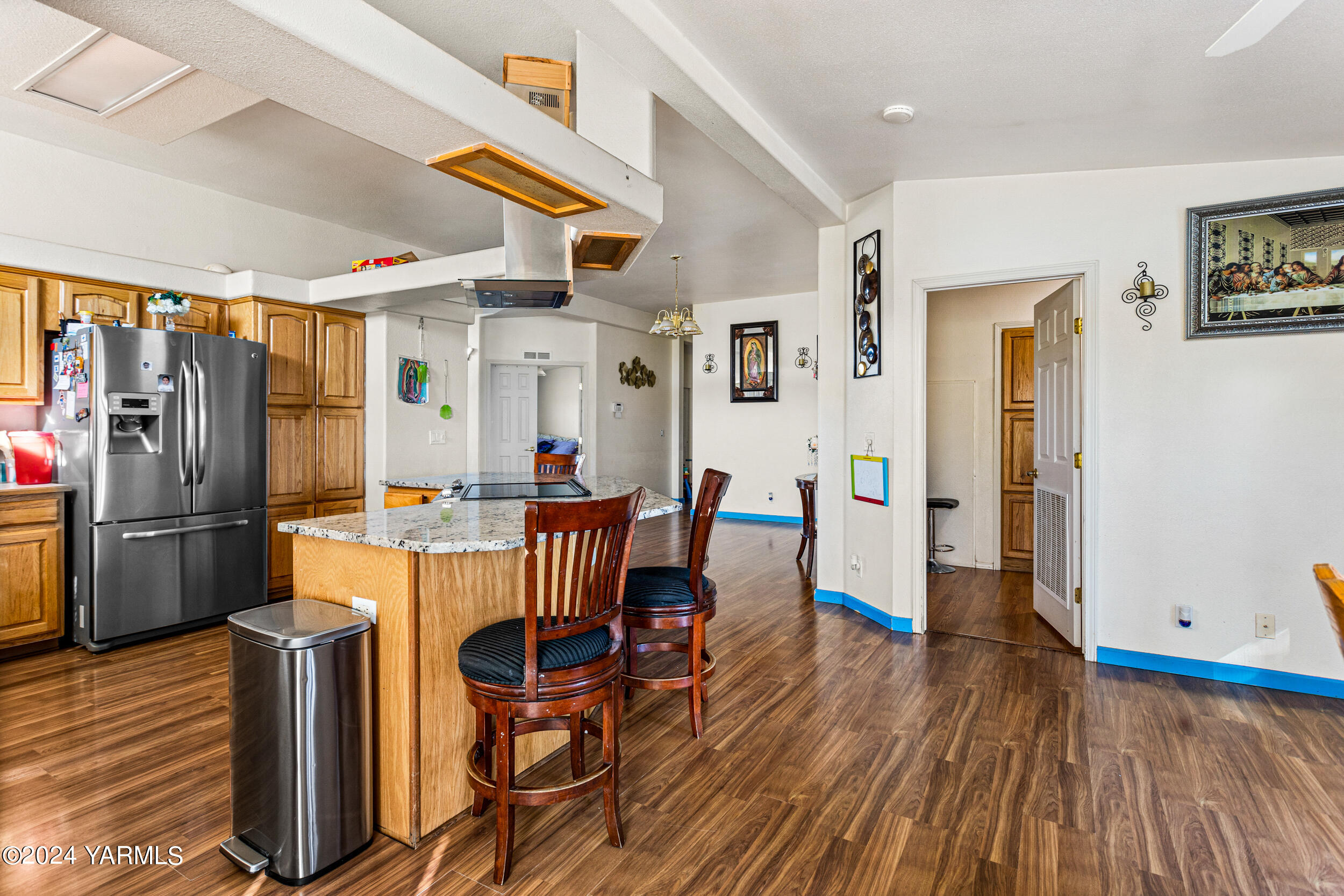 1649 Progressive Road Wapato, WA 98951 - Photo 9 of 30 a view of a dining room with furniture window and wooden floor