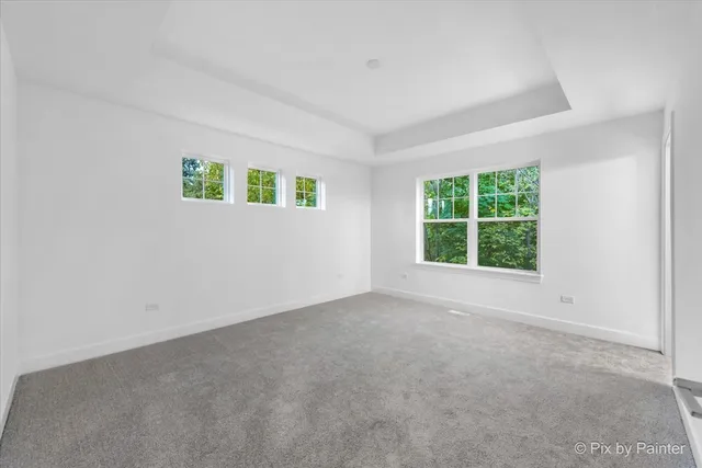 a view of an empty room and entryway