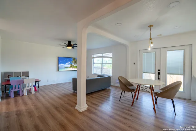 a view of a livingroom with furniture and wooden floor