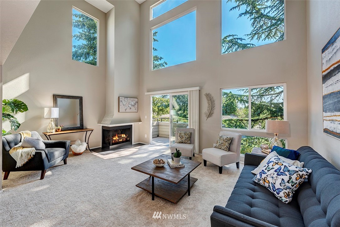 7501 Old Redmond Road, Unit 414 Redmond, WA 98052 - Photo 1 of 22 a living room with furniture and a fireplace