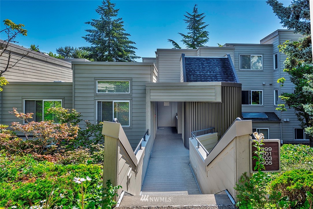 7501 Old Redmond Road, Unit 414 Redmond, WA 98052 - Photo 2 of 22 a front view of a house with garden