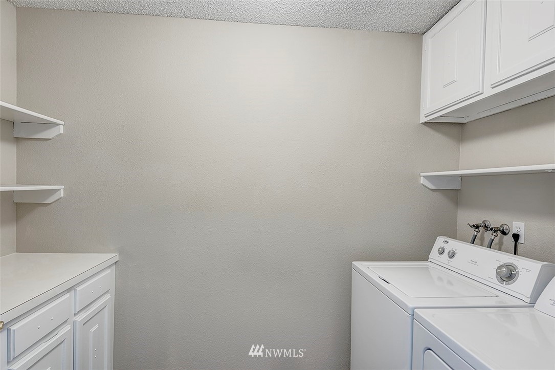 7501 Old Redmond Road, Unit 414 Redmond, WA 98052 - Photo 17 of 22 a utility room with dryer and washer
