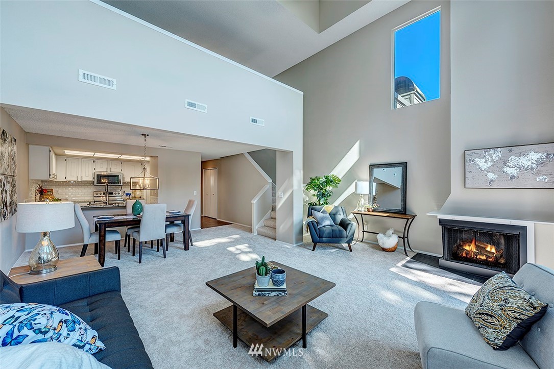 7501 Old Redmond Road, Unit 414 Redmond, WA 98052 - Photo 6 of 22 a living room with furniture and a fireplace