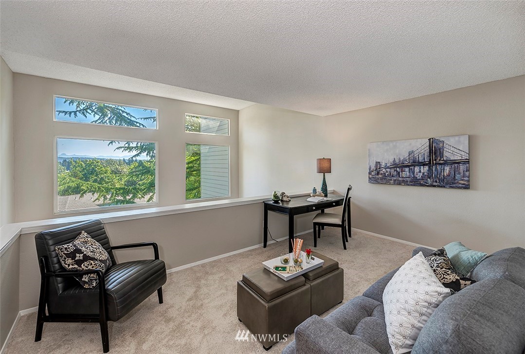 7501 Old Redmond Road, Unit 414 Redmond, WA 98052 - Photo 9 of 22 a living room with furniture and a window