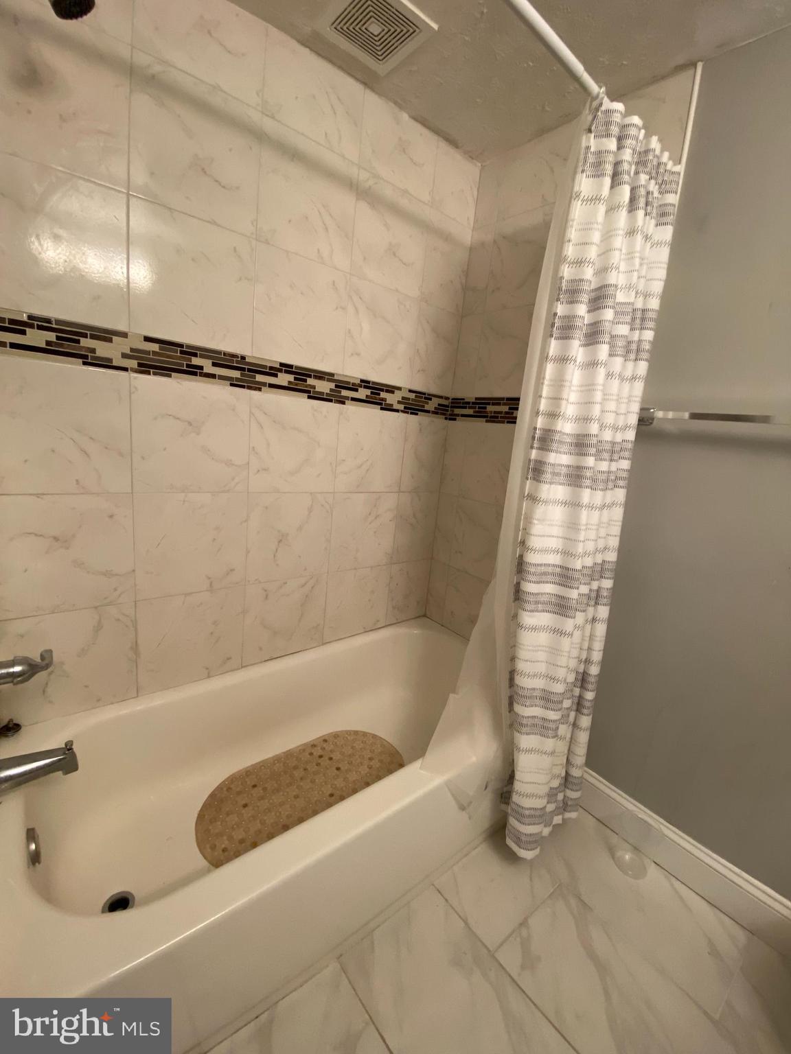 3120 North Rolling Road Baltimore, MD 21228 - Photo 27 of 57 Full bath with tub & shower