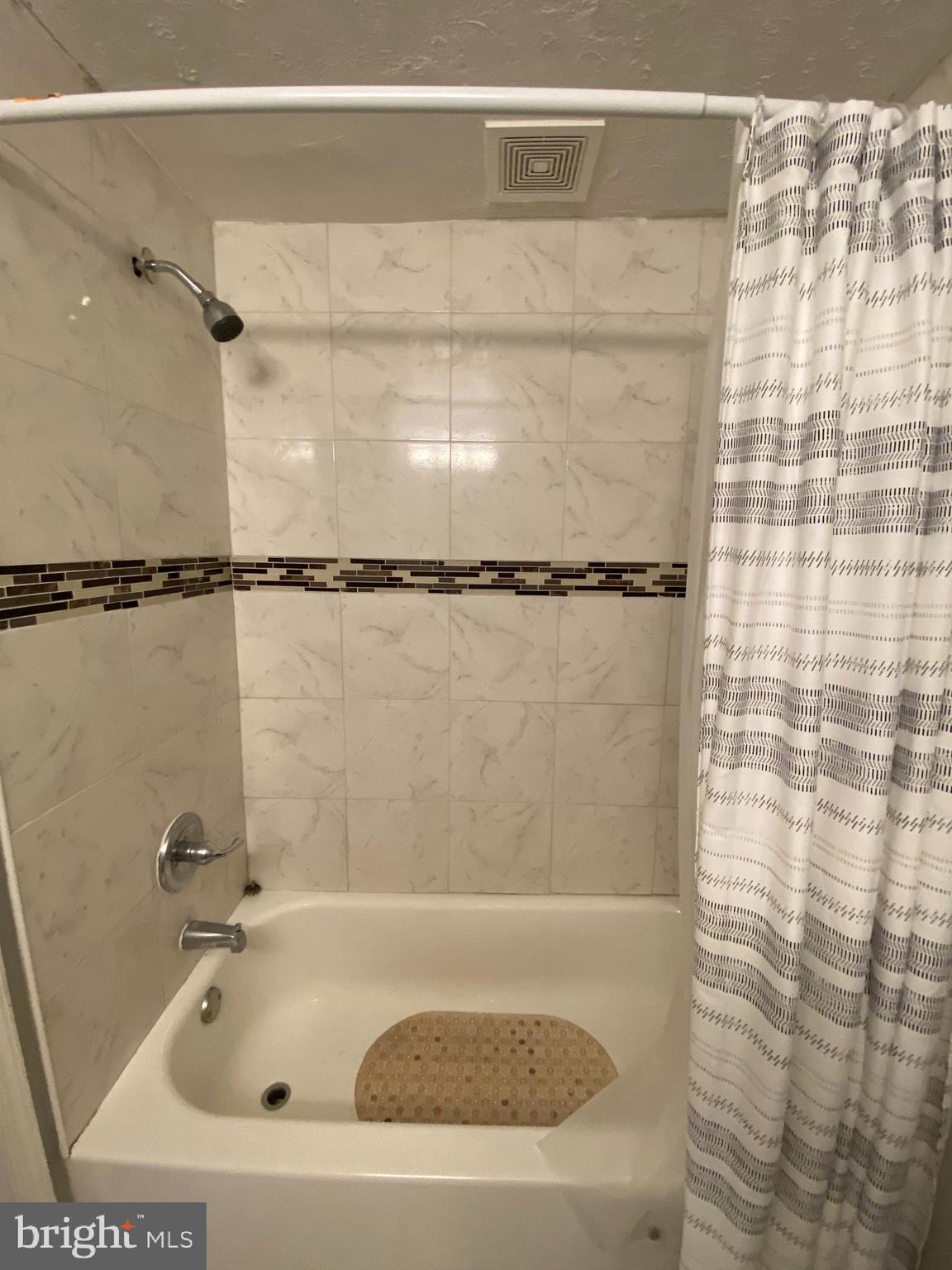3120 North Rolling Road Baltimore, MD 21228 - Photo 28 of 57 Full bath with tub & shower