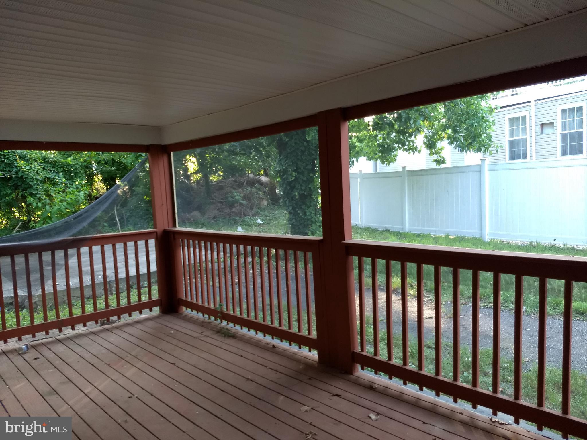 3120 North Rolling Road Baltimore, MD 21228 - Photo 5 of 57 Beautiful screened porch in side & rear yard