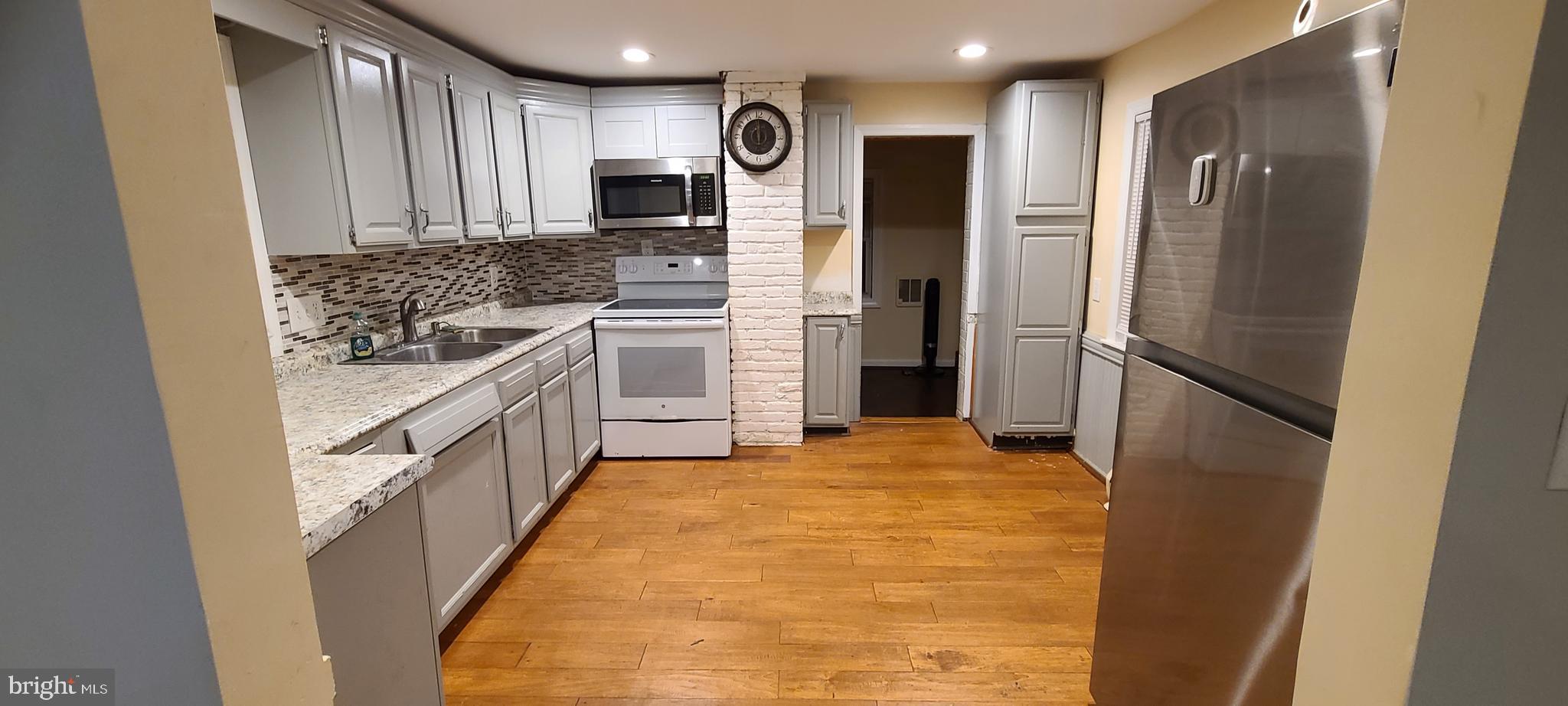 3120 North Rolling Road Baltimore, MD 21228 - Photo 46 of 57 View of kitchen fromfamily room