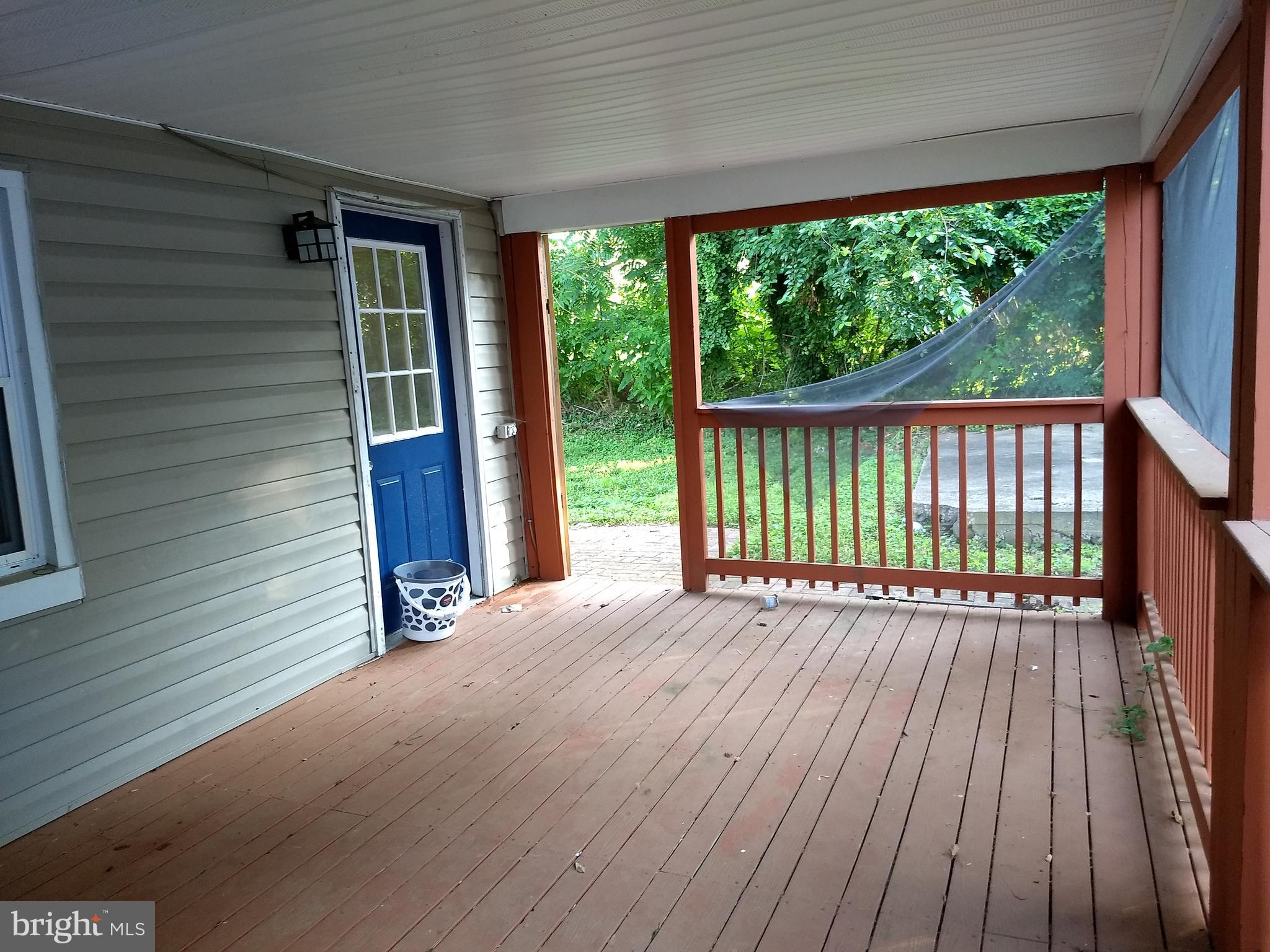 3120 North Rolling Road Baltimore, MD 21228 - Photo 6 of 57 Beautiful screened porch in side & rear yard