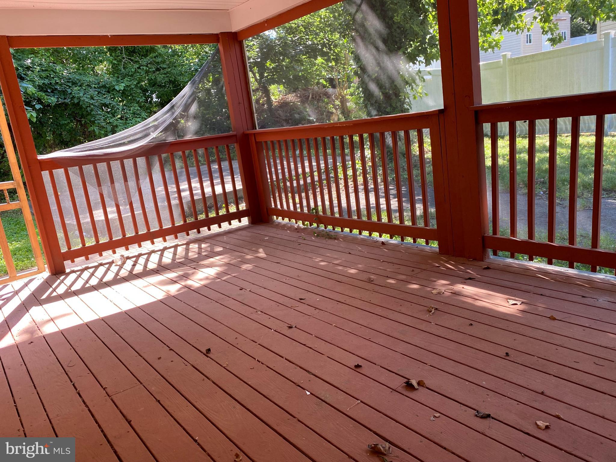 3120 North Rolling Road Baltimore, MD 21228 - Photo 7 of 57 BIG sized porch in side & rear of your home!