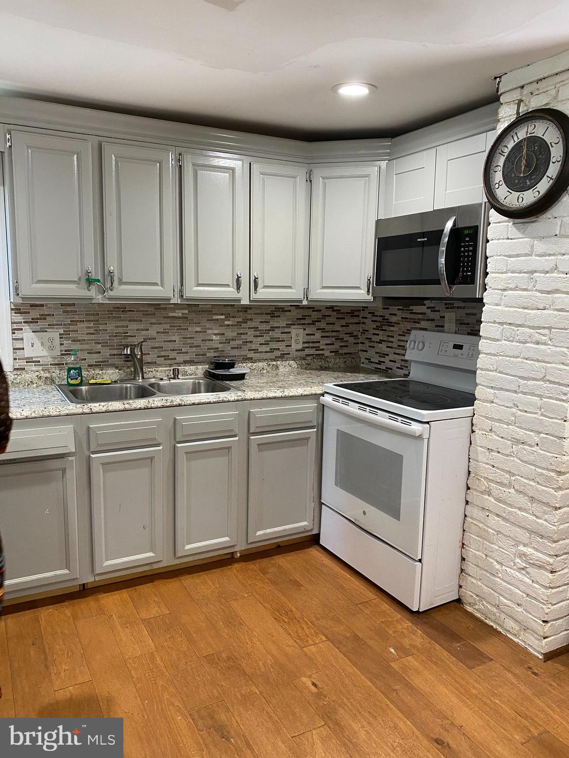 3120 North Rolling Road Baltimore, MD 21228 - Photo 10 of 57 Spacious white kitchen