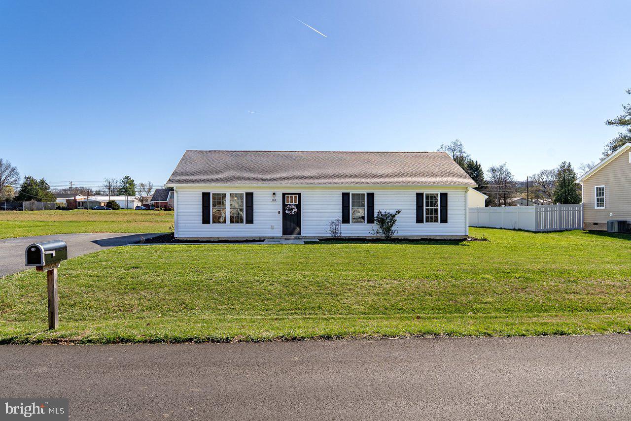 107 8th Street Grottoes, VA 24441 - Photo 37 of 45 a front view of a house with a garden and lake view