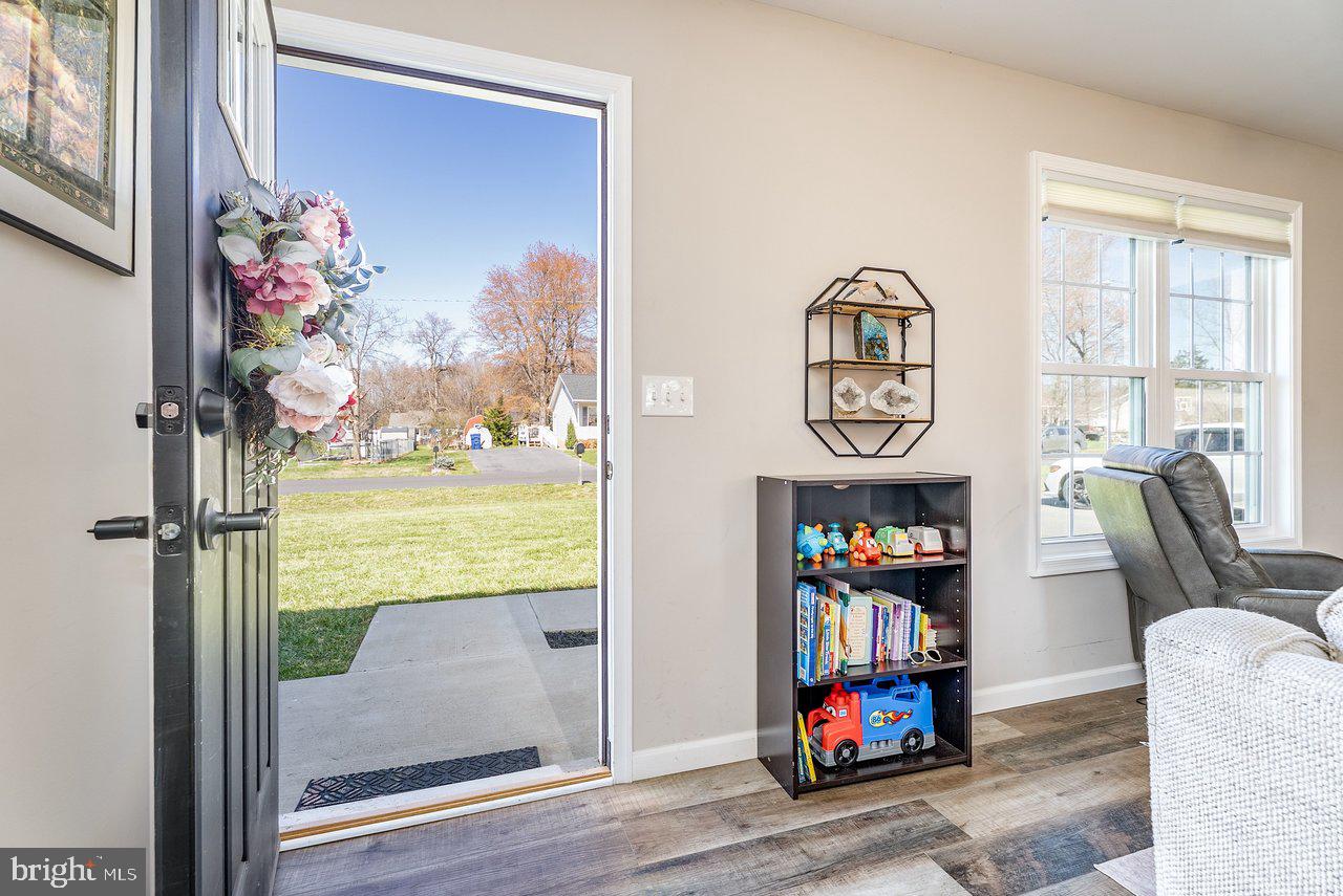 107 8th Street Grottoes, VA 24441 - Photo 4 of 45 a living room with fireplace furniture and a window