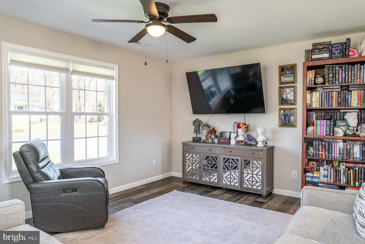 107 8th Street Grottoes, VA 24441 - Photo 7 of 45 a living room with furniture and a flat screen tv