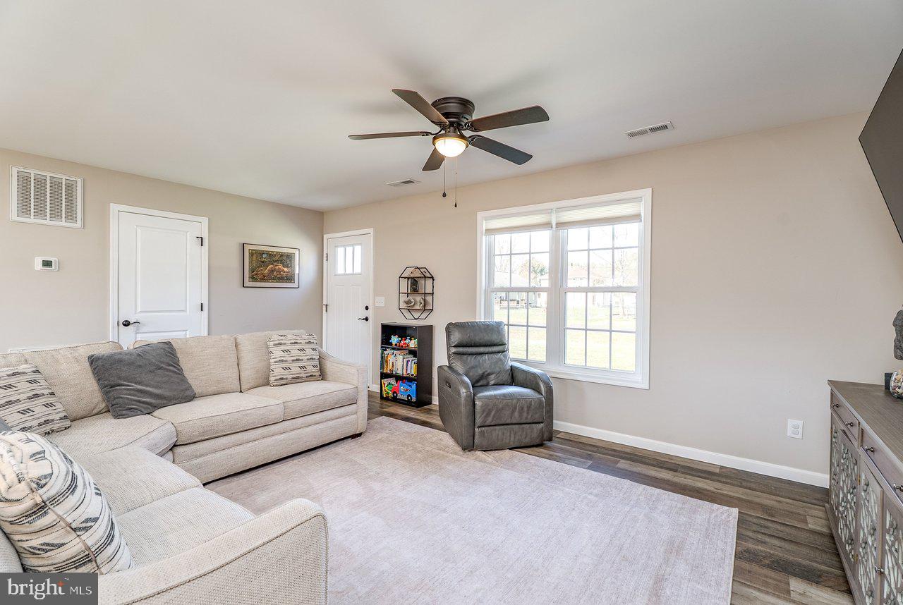 107 8th Street Grottoes, VA 24441 - Photo 9 of 45 a living room with furniture and a window