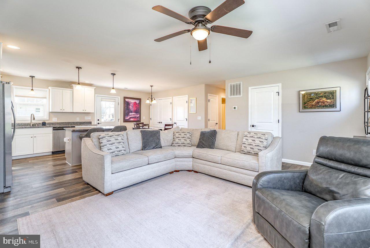 107 8th Street Grottoes, VA 24441 - Photo 10 of 45 a living room with furniture and kitchen view