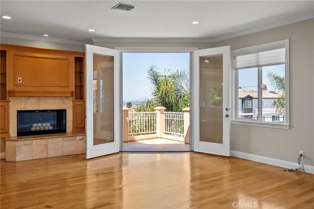 a side view of a house with a street