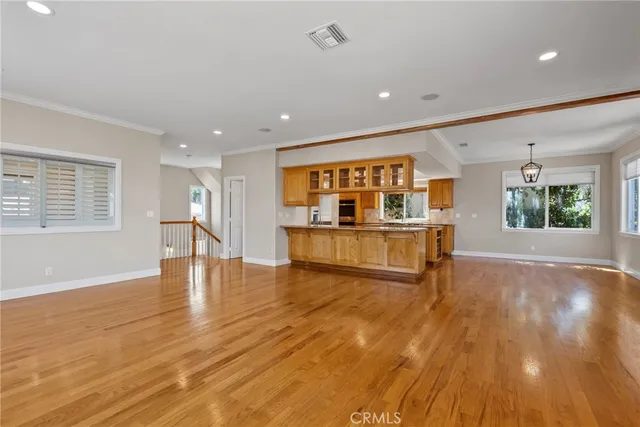 a kitchen that has a stove and a sink