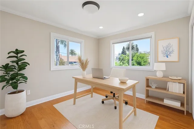 a bedroom with a bed and a table in it