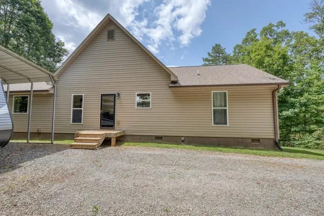 a view of backyard with cabin