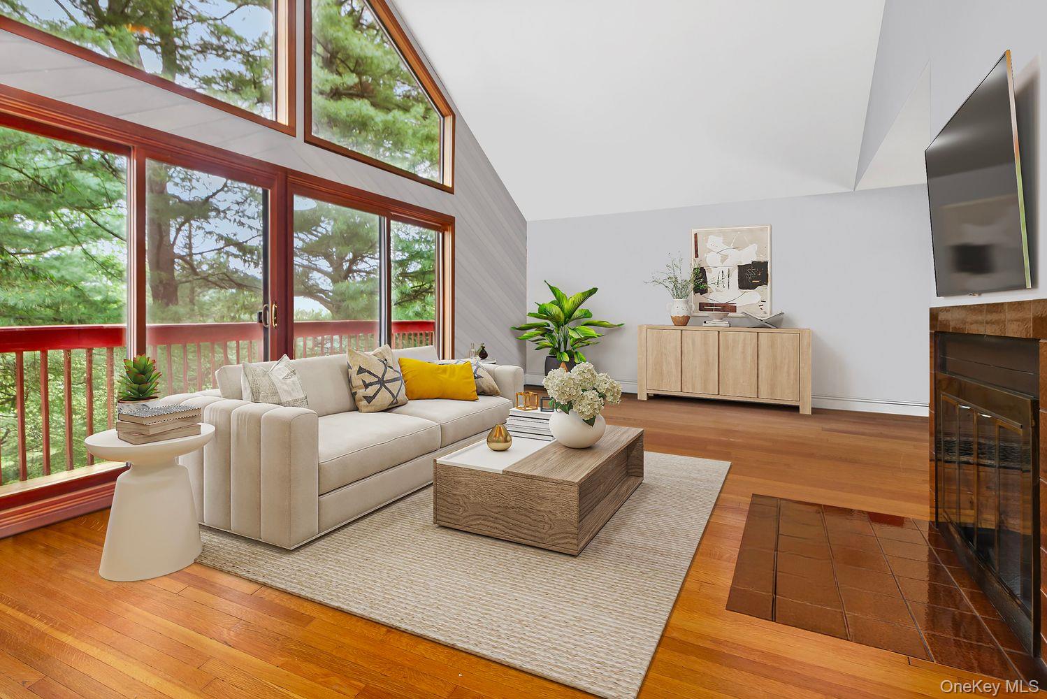 12 Ilana Court Armonk, NY 10504 - Photo 12 of 33 a living room with furniture and a large window
