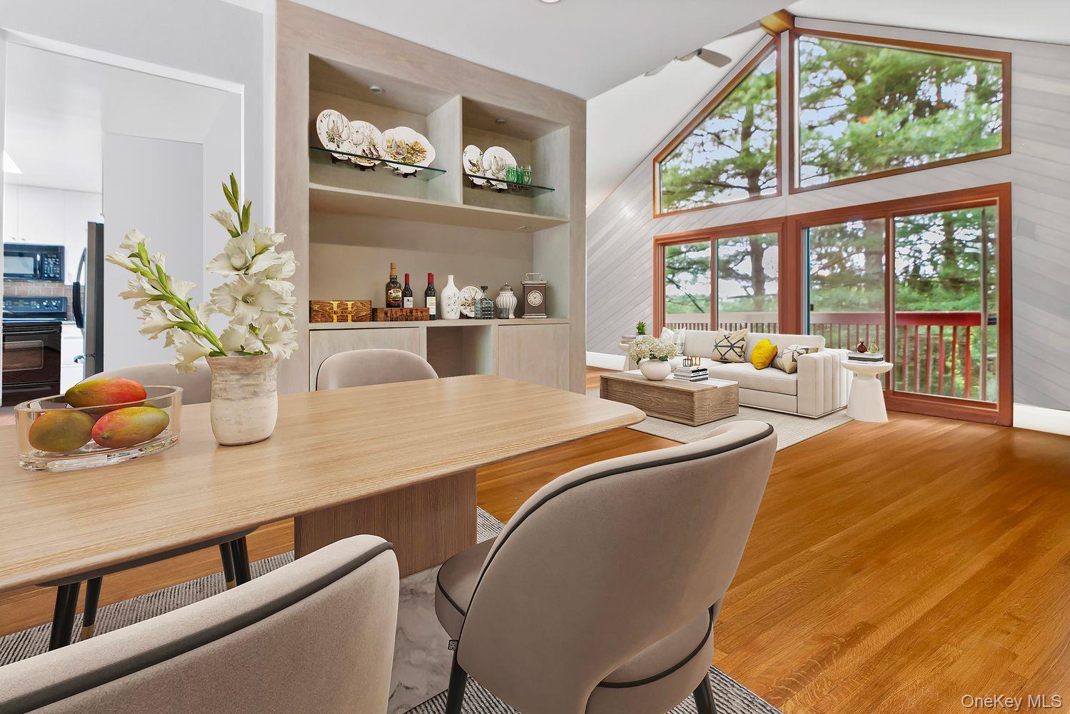 12 Ilana Court Armonk, NY 10504 - Photo 15 of 33 a dining room with furniture a rug and wooden floor