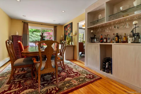 a kitchen with stainless steel appliances a stove microwave and sink