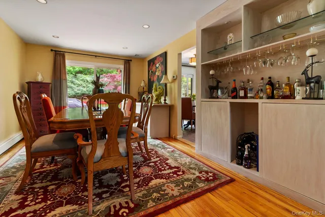 a kitchen with stainless steel appliances a stove microwave and sink