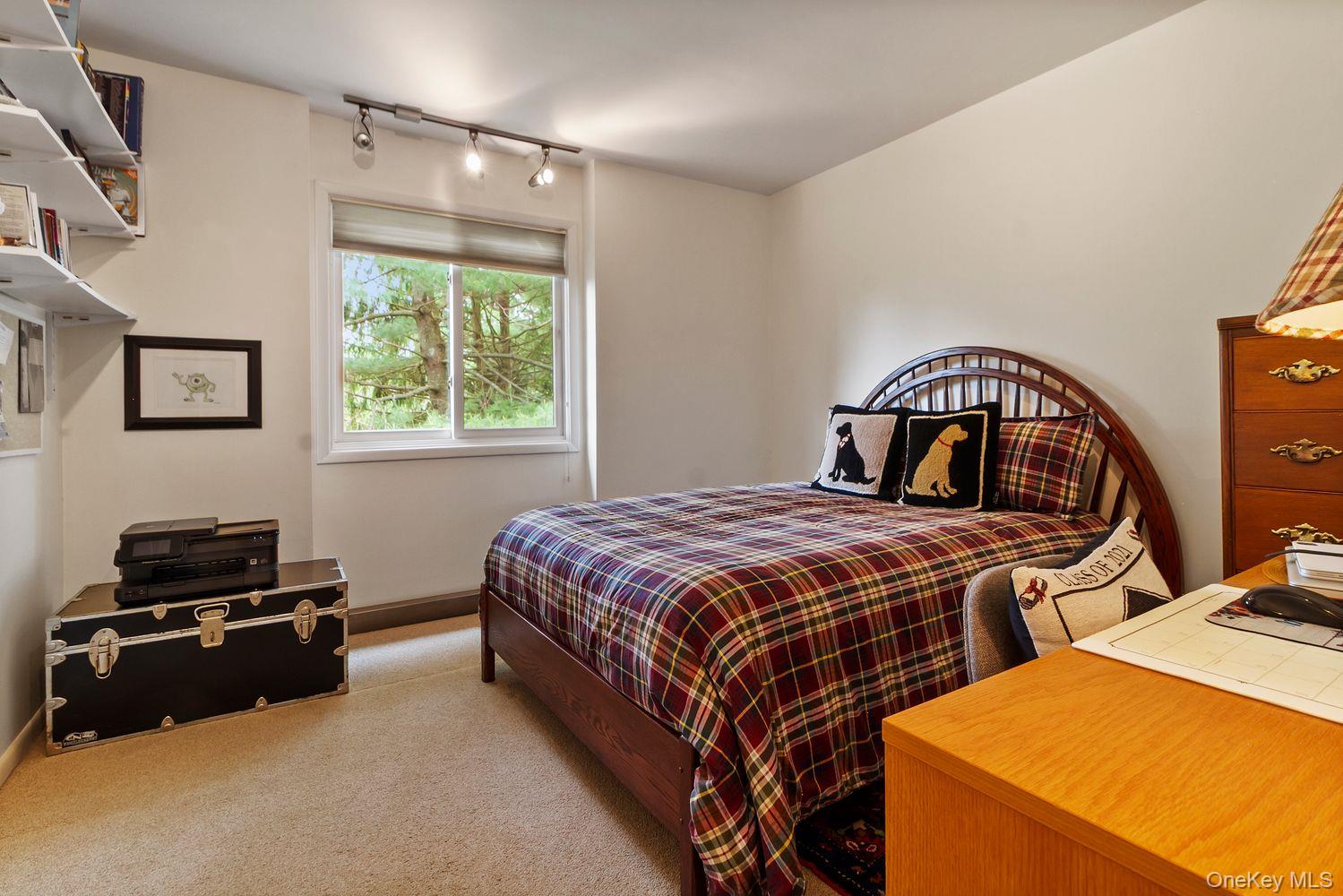 12 Ilana Court Armonk, NY 10504 - Photo 21 of 33 a bedroom with bed and a window