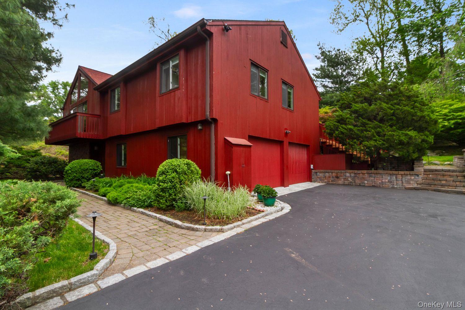 12 Ilana Court Armonk, NY 10504 - Photo 30 of 33 a front view of a house with a yard