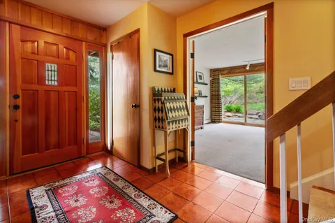 a view of entryway with a front door