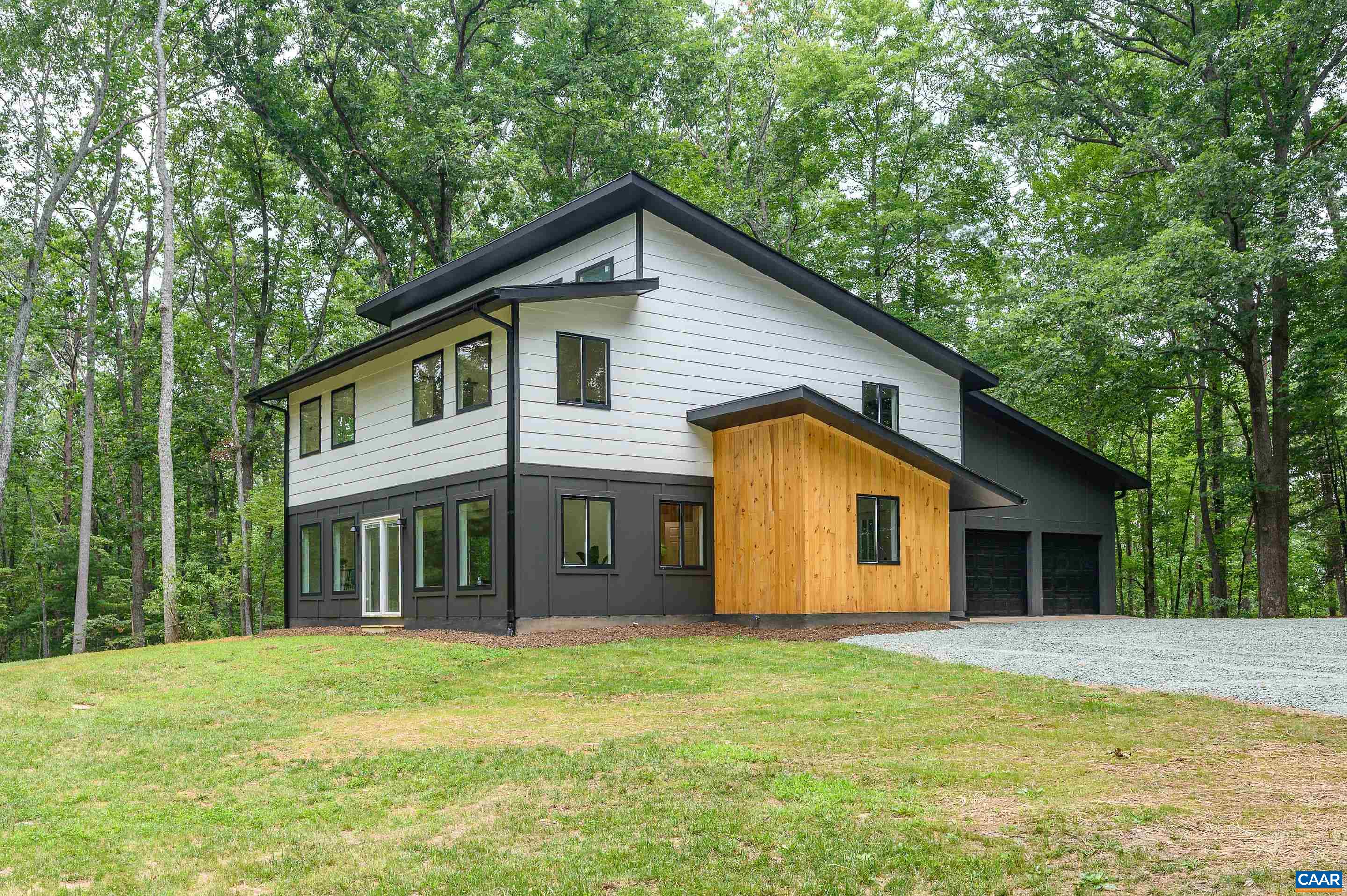 960 Broad Axe Road Charlottesville, VA 22903 - Photo 1 of 39 a view of a house with backyard and garden
