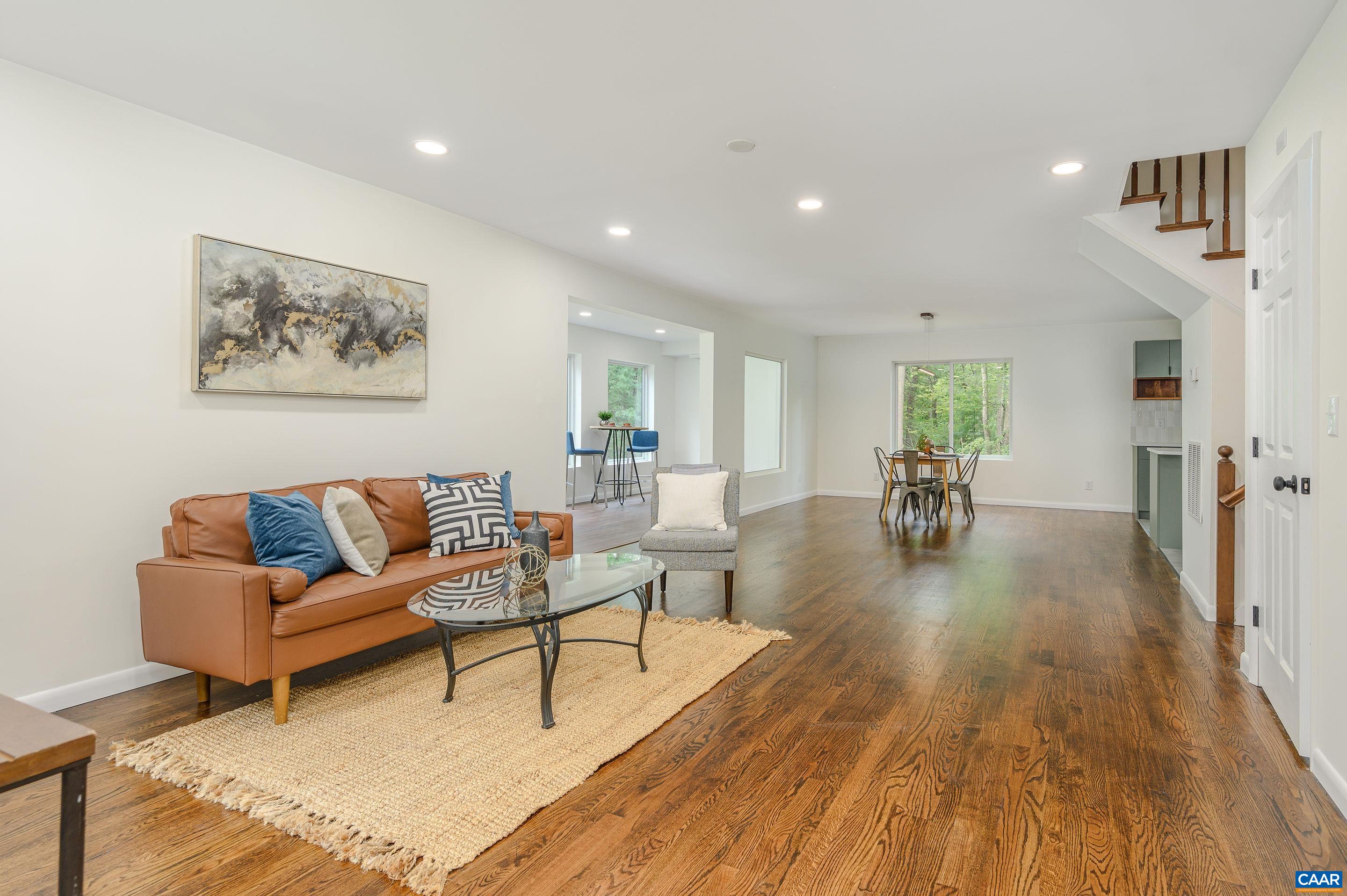 960 Broad Axe Road Charlottesville, VA 22903 - Photo 11 of 39 a living room with furniture and a wooden floor