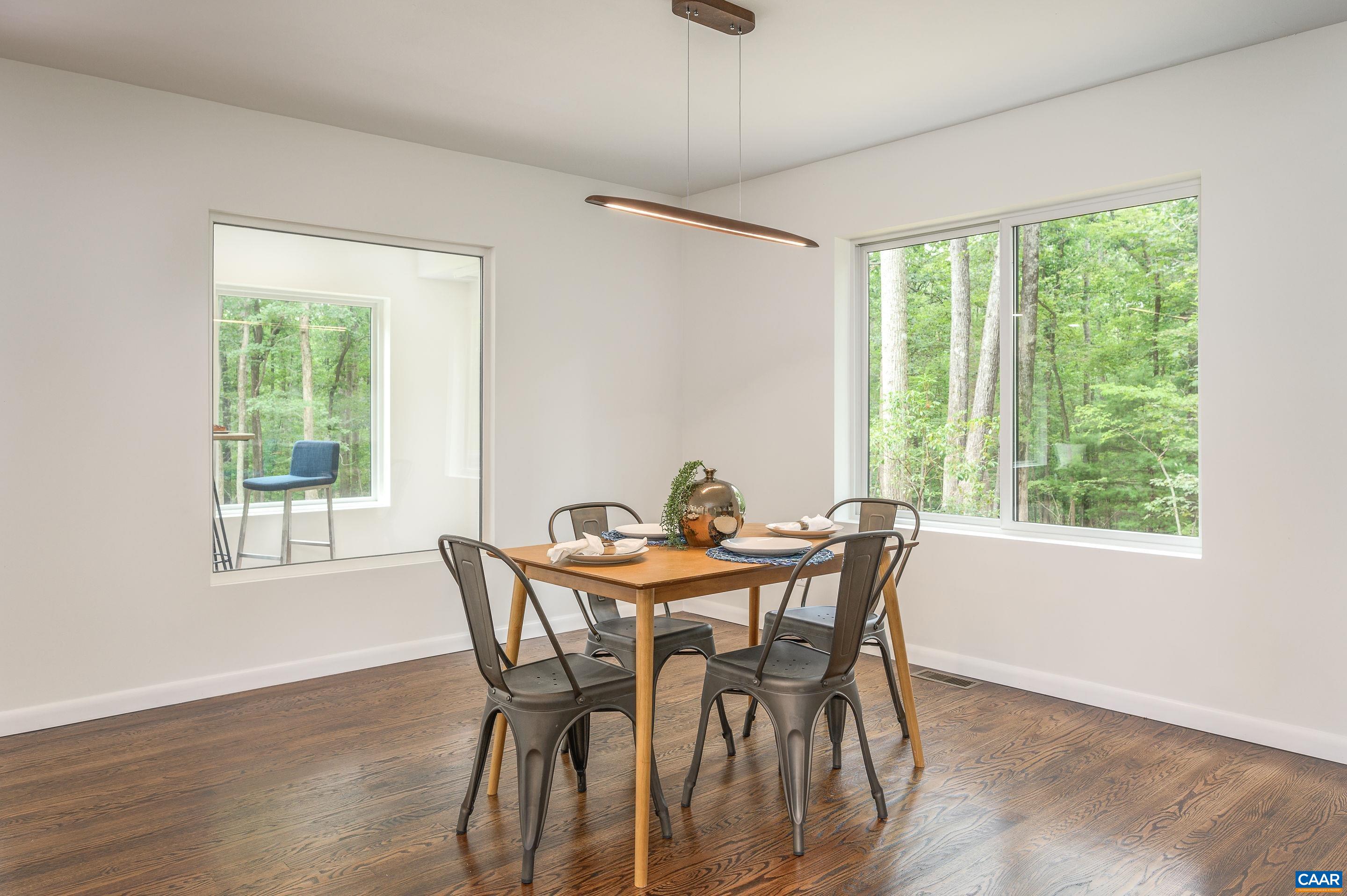 960 Broad Axe Road Charlottesville, VA 22903 - Photo 12 of 39 a view of a dining room with furniture window and outside view