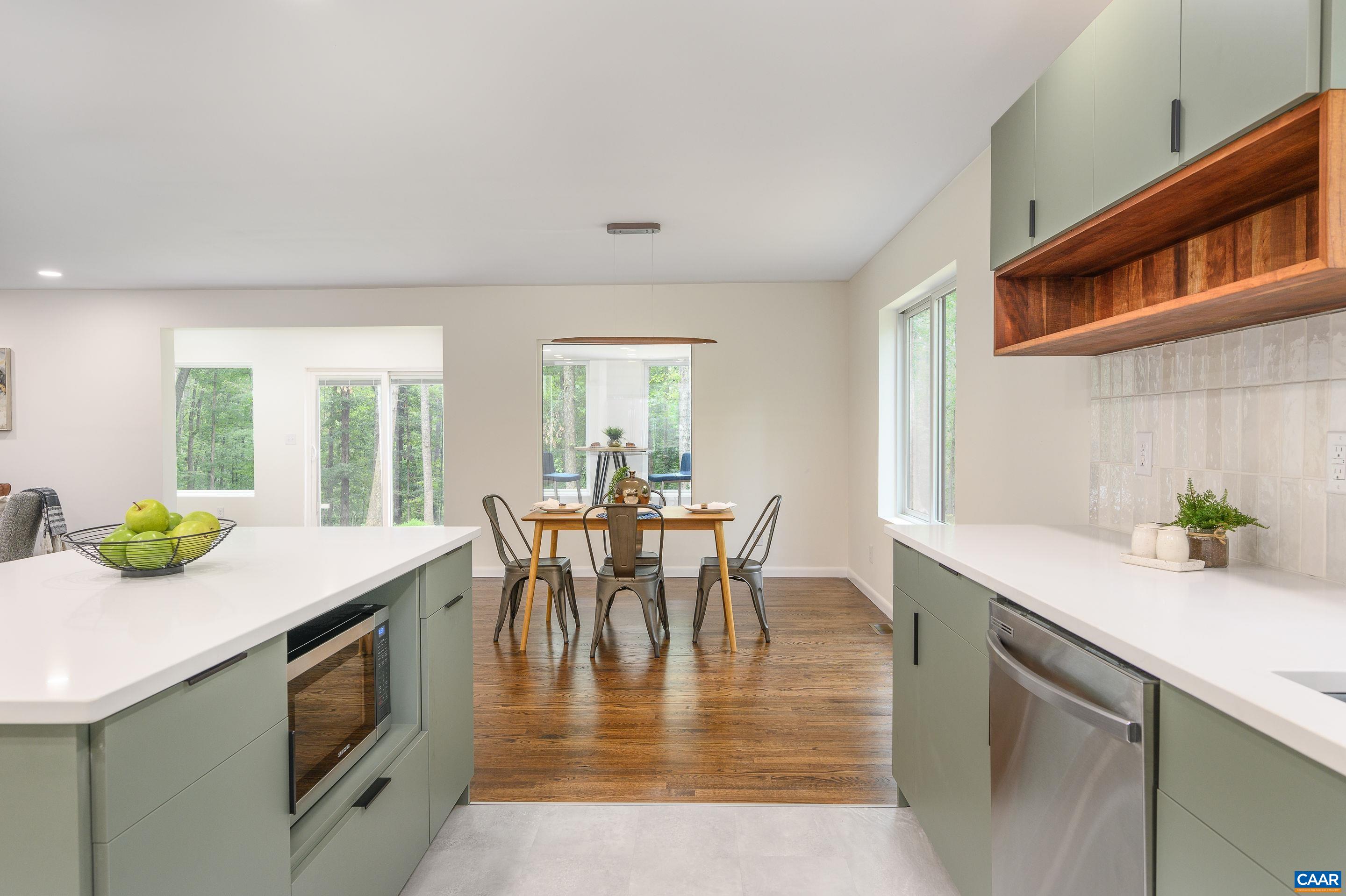 960 Broad Axe Road Charlottesville, VA 22903 - Photo 19 of 39 a view of a dining room with furniture and window