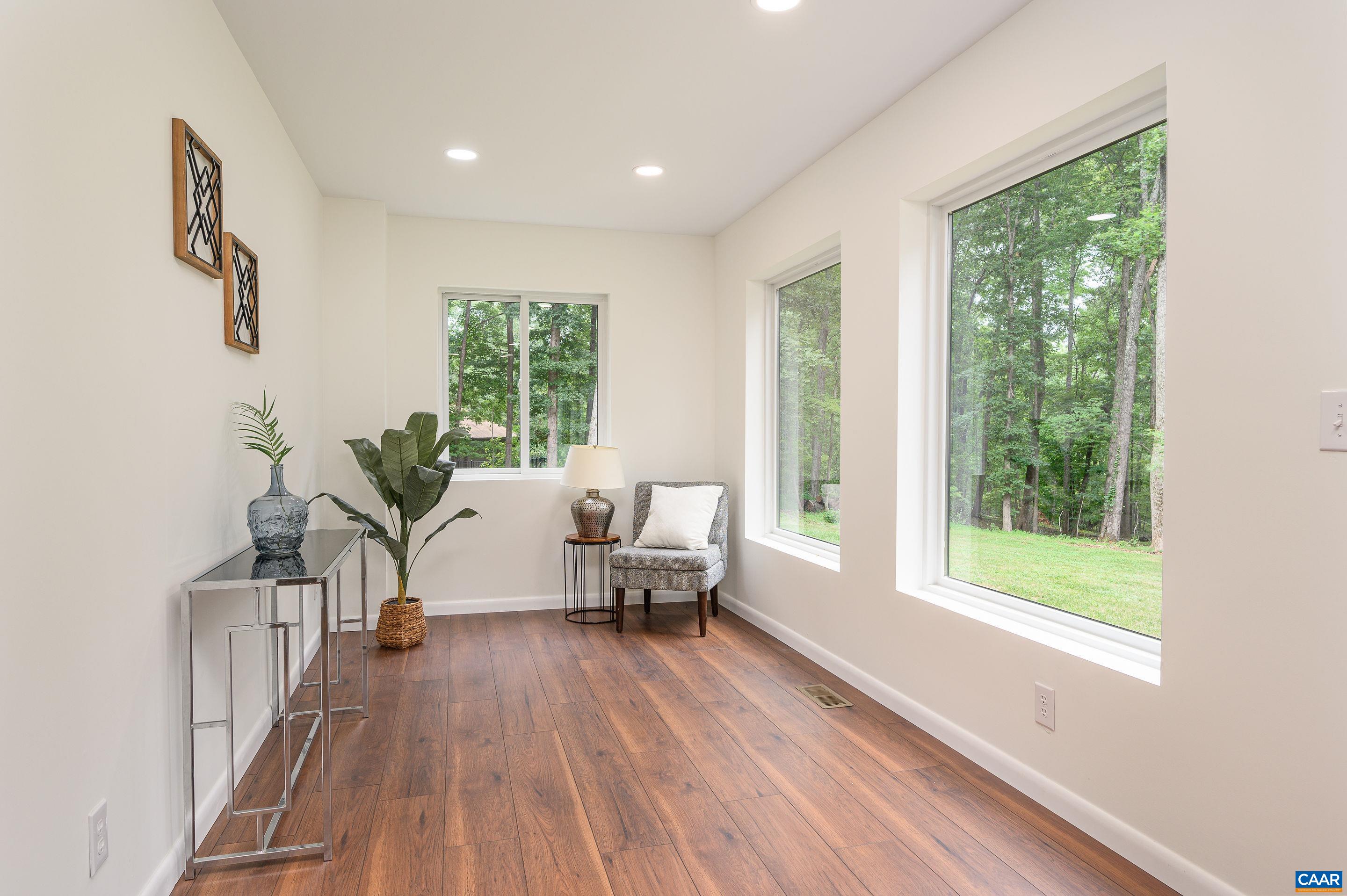 960 Broad Axe Road Charlottesville, VA 22903 - Photo 21 of 39 a living room with furniture and a large window