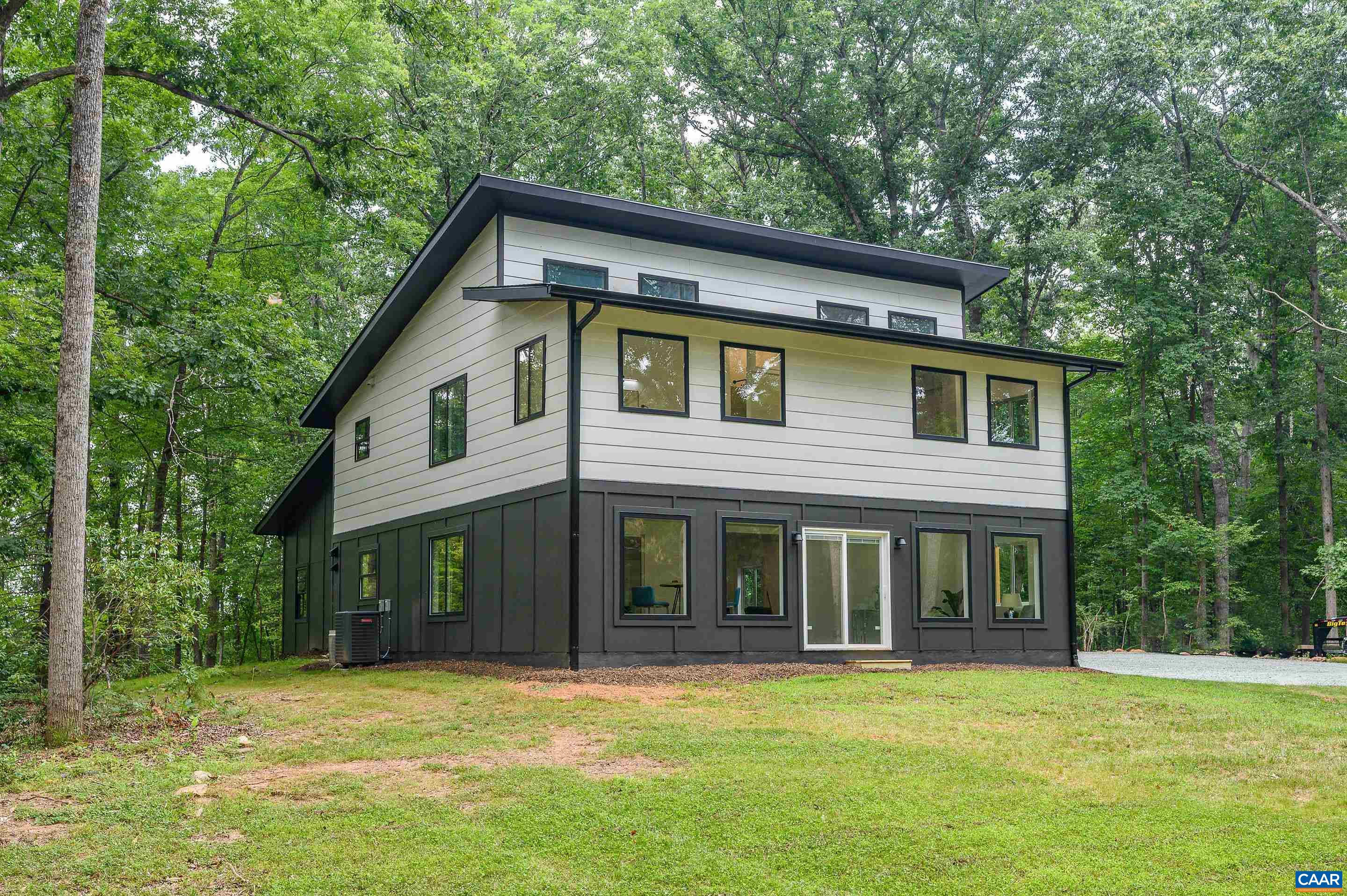 960 Broad Axe Road Charlottesville, VA 22903 - Photo 3 of 39 a view of a house with a yard plants and large tree