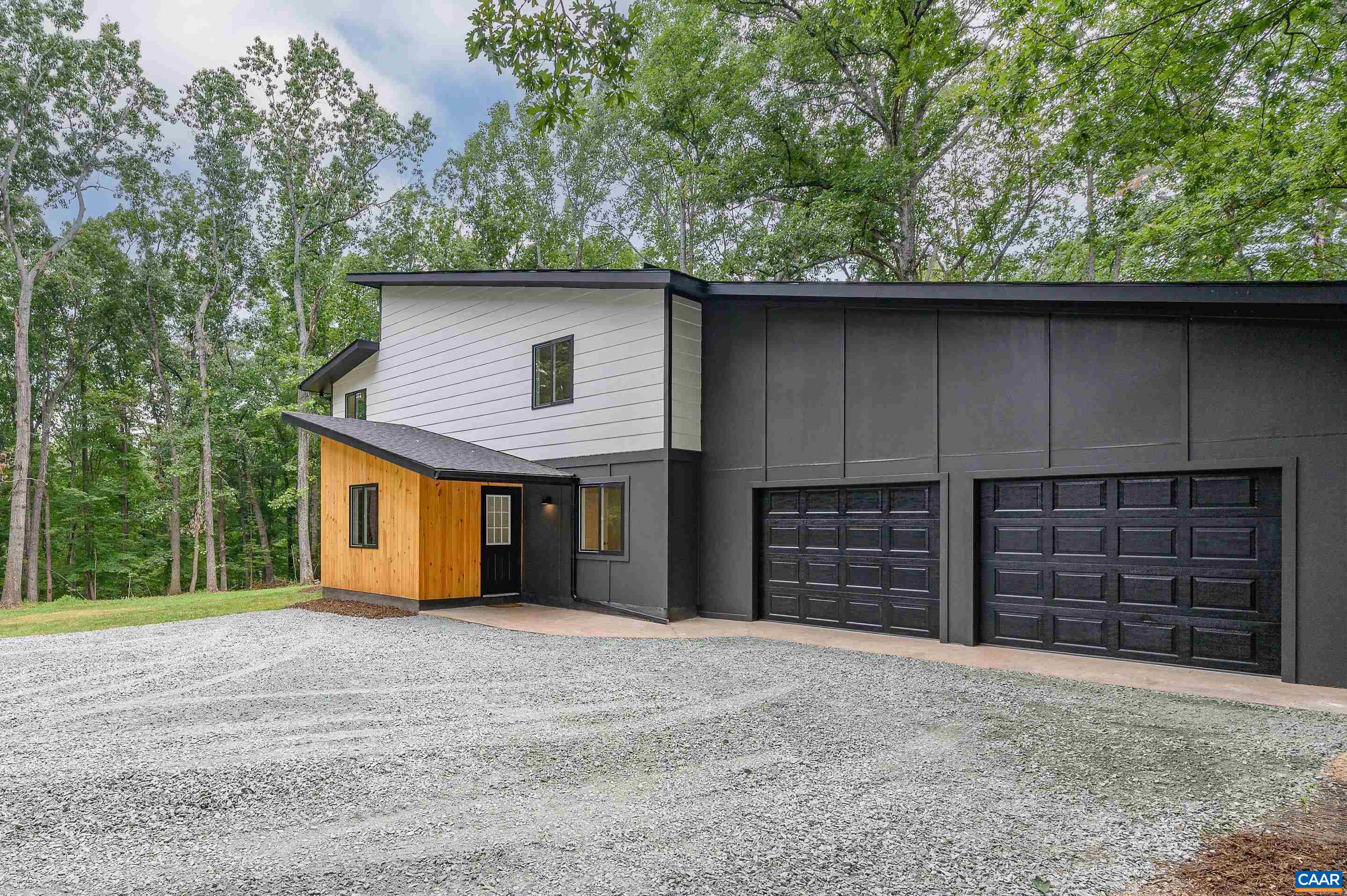 960 Broad Axe Road Charlottesville, VA 22903 - Photo 38 of 39 front view of a house with a yard
