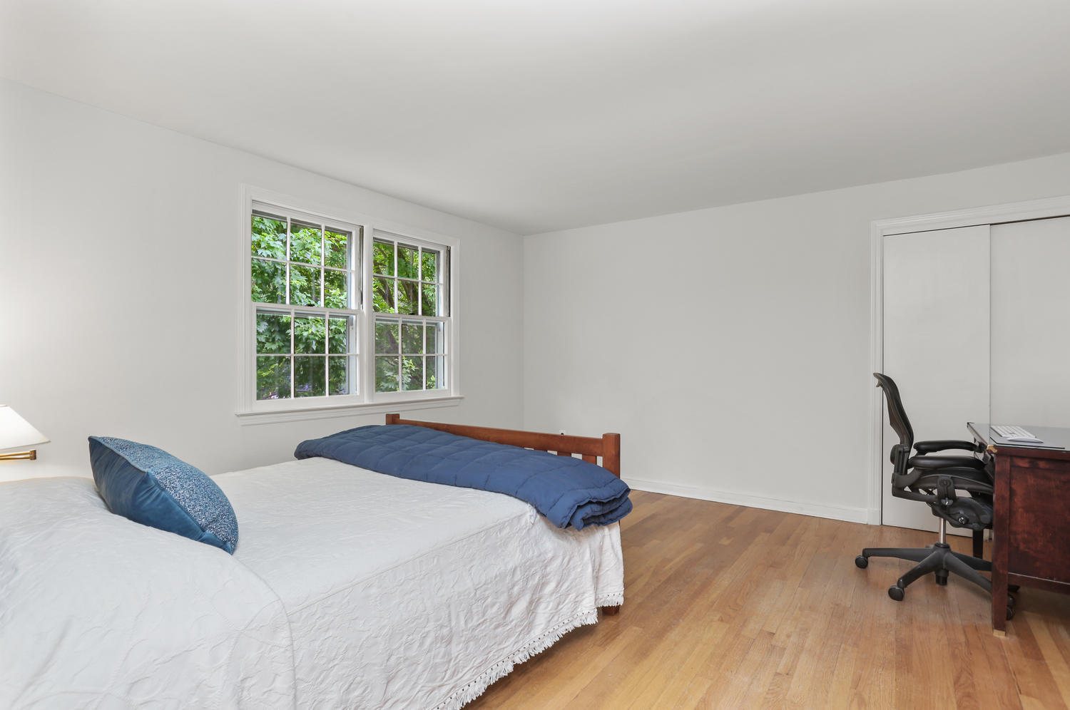 9 Alpine Lane Darien, CT 06820 - Photo 15 of 23 a bedroom with a bed and a desk